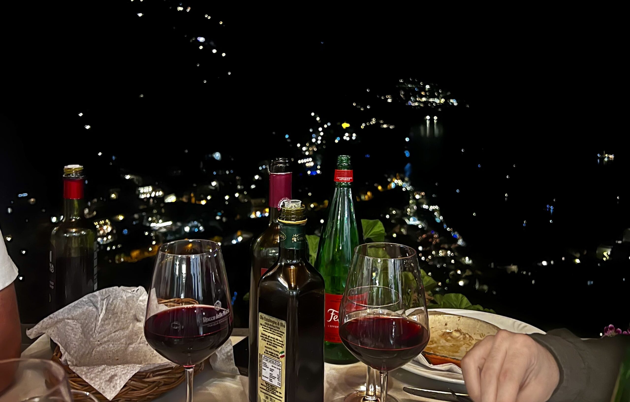 The view of Positano at night from the restaurant Da Constantino